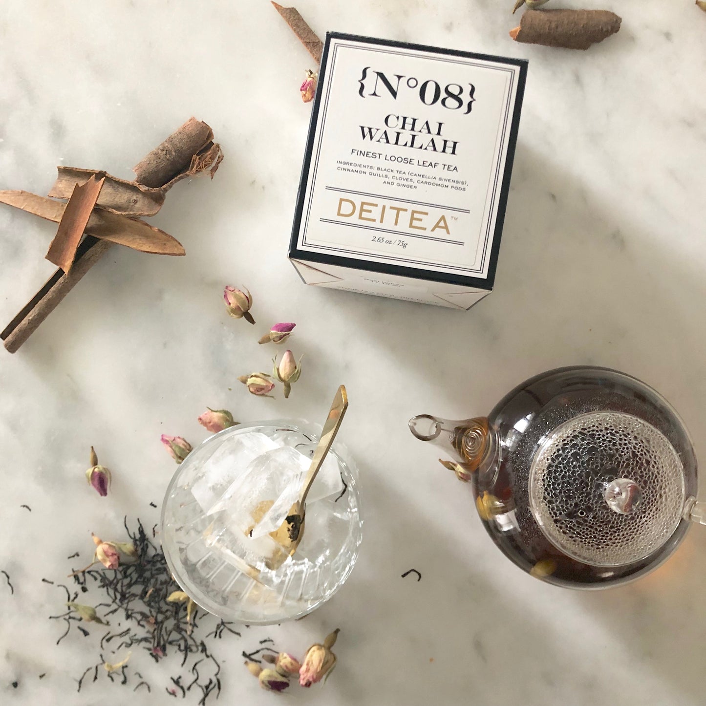 Deitea's No.08 Chai Wallah Loose Leaf Tea poured over ice and coconut milk – a refreshing spiced tea blend with cinnamon, cardamom, cloves, and ginger.