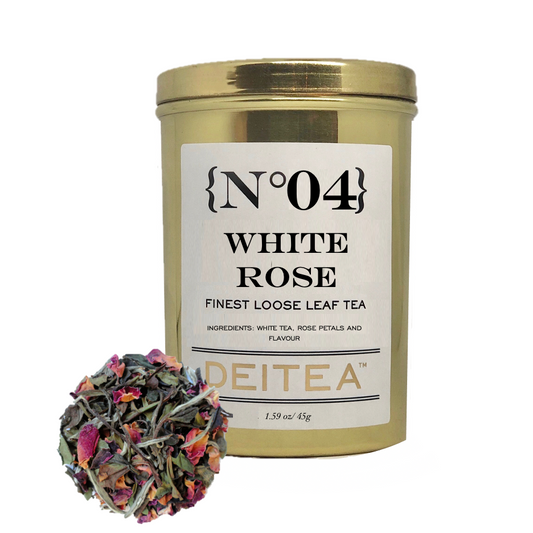 White rose tea in elegant gold tea caddy 
